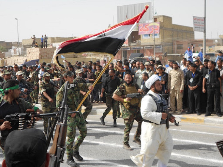 جانب من استعراض عسكري سابق لسرايا السلام في مدينة الصدر شرقي العاصمة بغداد