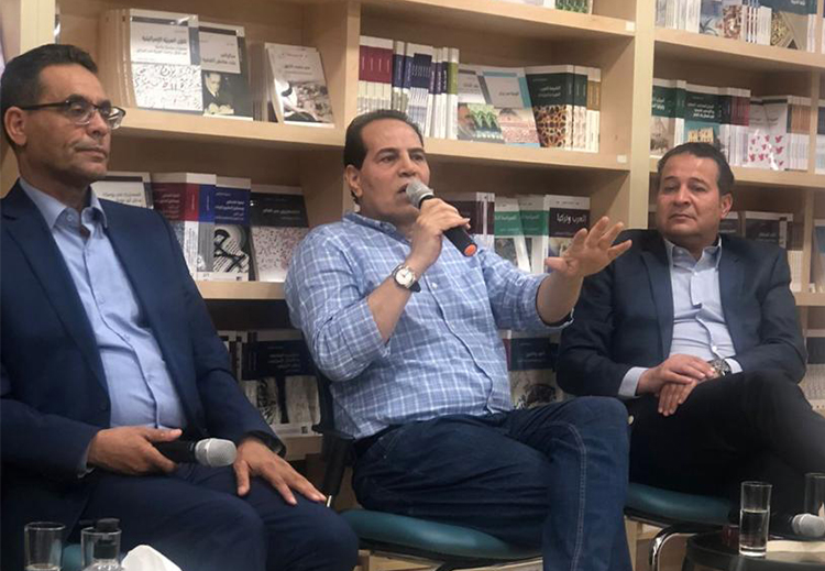 مؤلفا الكتاب د. محمد أبو رمان، وحسن أبو هنية، والمتحدث د. بدر ماضي 
