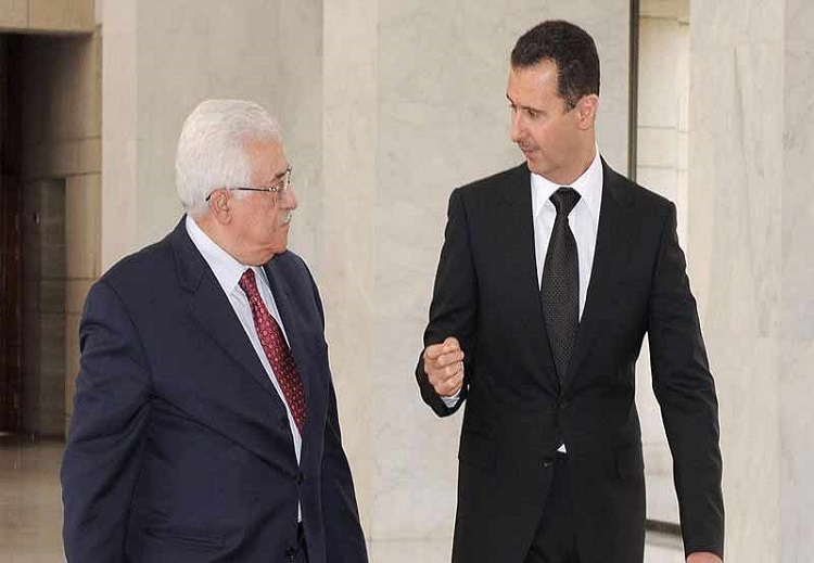 الأسد أهدى محمود عباس مصحفاً مكتوباً بماء الذهب