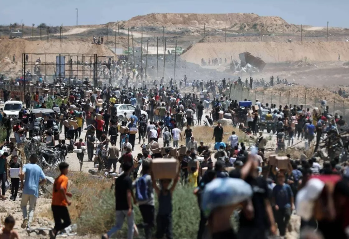 غزة: الجيش الإسرائيلي يستخدم مراكز المساعدات الأمريكية لحصد أرواح الجياع غزة: الجيش الإسرائيلي يستخدم مراكز المساعدات الأمريكية لحصد أرواح الجياع